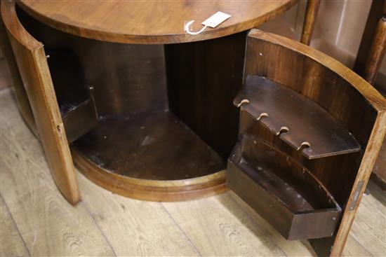 An Art Deco circular walnut coffee table with internal bar Diameter 83cm